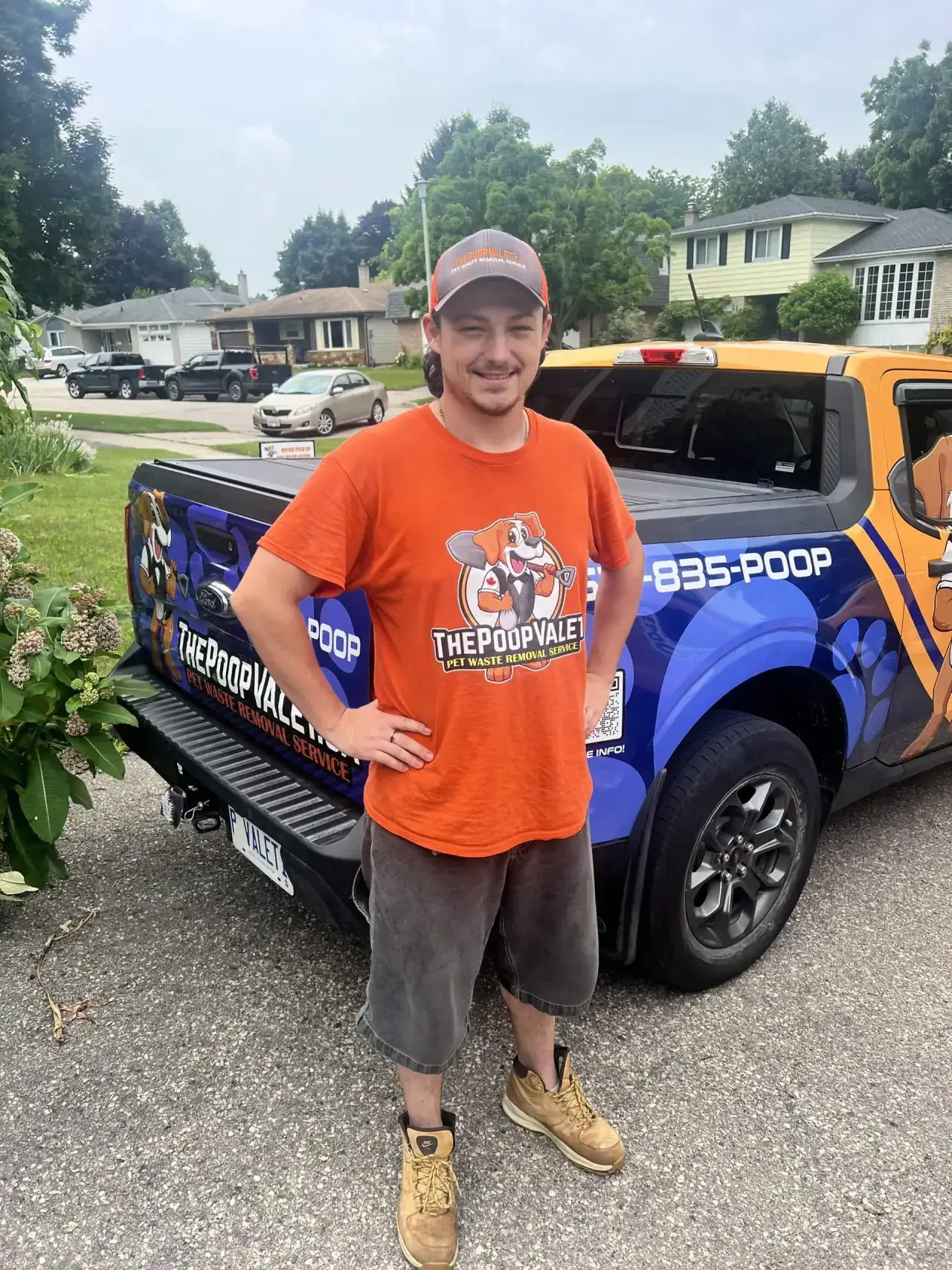 The Poop Valet technician completing a professional yard cleanup