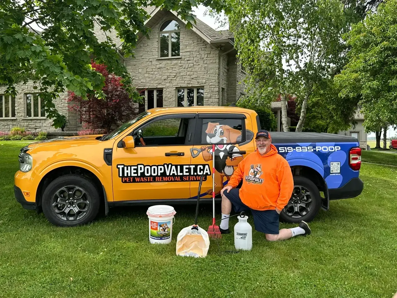 The Poop Valet technician preparing a one-time yard cleanup